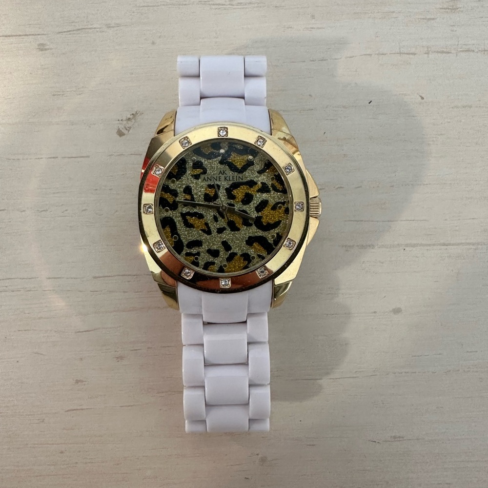 Anne Klein Gold-Tone Watch with White Band and Leopard Dial
